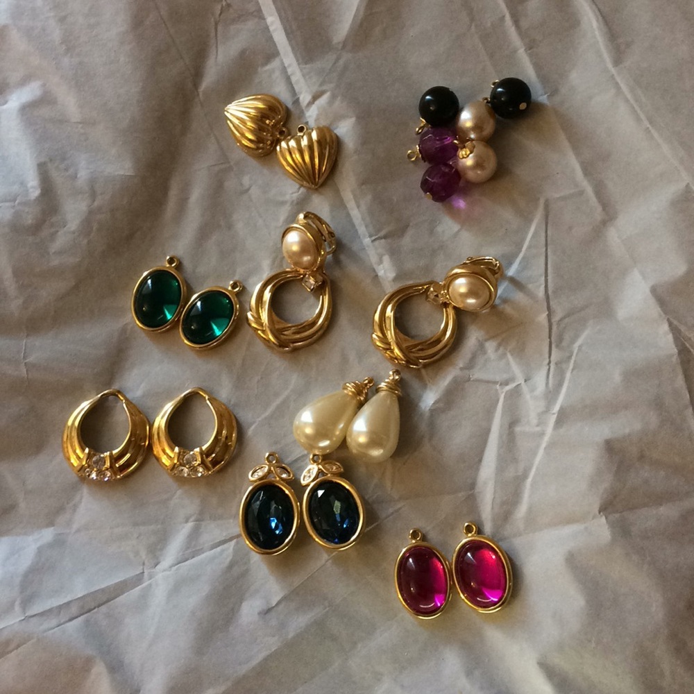 Nolan Miller clip earrings with ten sets of charms
